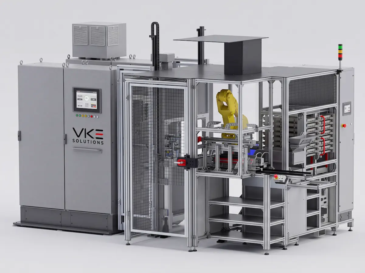 Eingehauste Roboterzelle mit Schaltschrank und Fanuc-Roboter zum Tray-Handling
